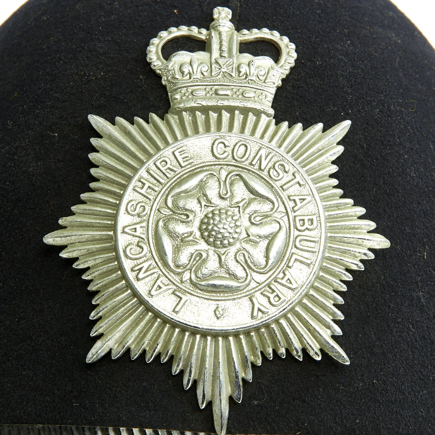 Original British Queen's Crown Rose Top Bobby Helmet from the Lancashire Constabulary